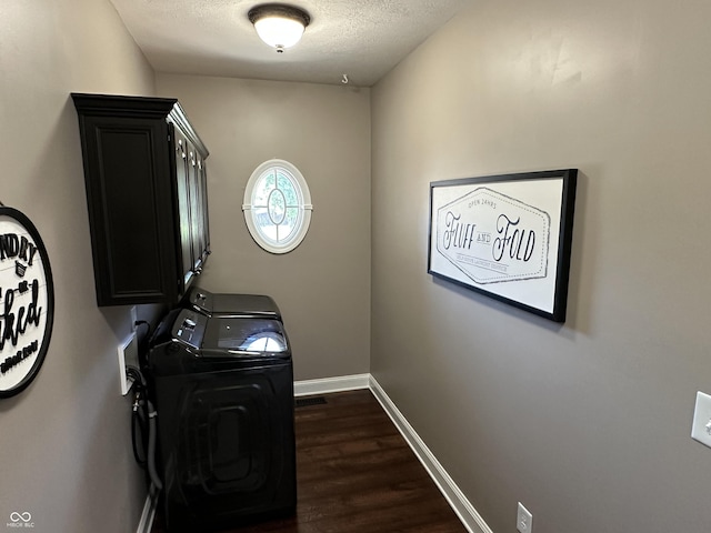 entryway featuring baseboards, a textured ceiling, and dark wood-style floors