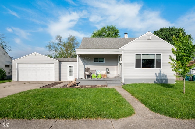 view of front facade featuring covered porch, a front yard, concrete driveway, an attached garage, and roof with shingles