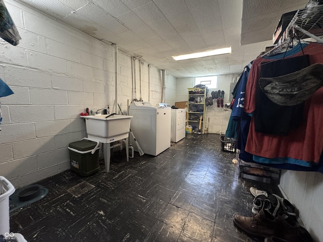 144 S 7th Ave, Beech Grove, IN 46107 - basement with independent washer and dryer, dark floors, concrete block wall, and a sink