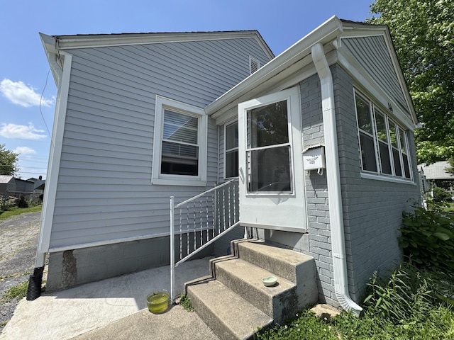 144 S 7th Ave, Beech Grove, IN 46107 - view of side of home with brick siding