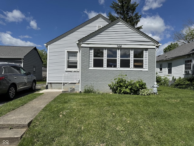 144 S 7th Ave, Beech Grove, IN 46107 - view of front of home featuring a front lawn