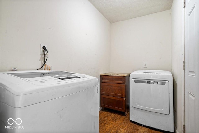 1170 N Concord St, Indianapolis, IN 46222 - washroom with dark wood-type flooring, a textured ceiling, and washing machine and dryer