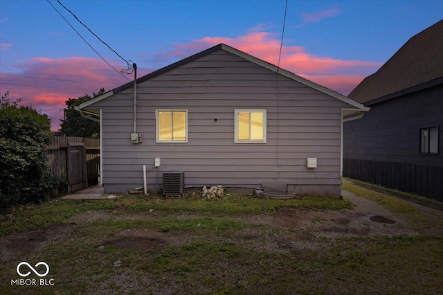1170 N Concord St, Indianapolis, IN 46222 - back of property featuring fence and central AC