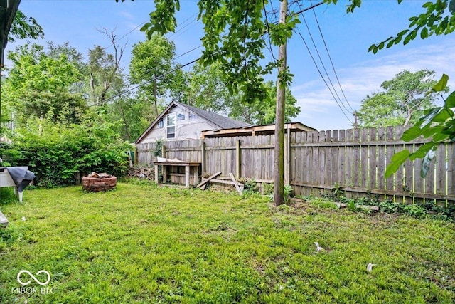 1170 N Concord St, Indianapolis, IN 46222 - view of yard featuring a fire pit