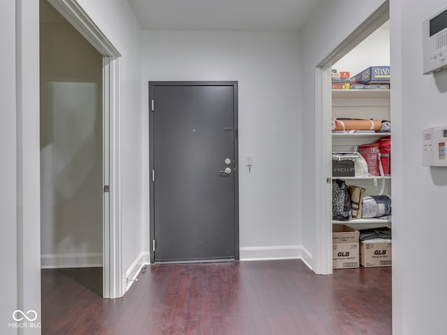 222 N E St Unit 103, Indianapolis, IN 46204 - foyer with hardwood / wood-style floors and baseboards