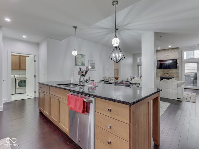 222 N E St Unit 103, Indianapolis, IN 46204 - kitchen featuring dishwasher, washer / clothes dryer, dark wood finished floors, open floor plan, and light brown cabinetry