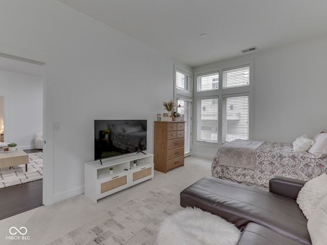 222 N E St Unit 103, Indianapolis, IN 46204 - bedroom featuring carpet flooring and baseboards