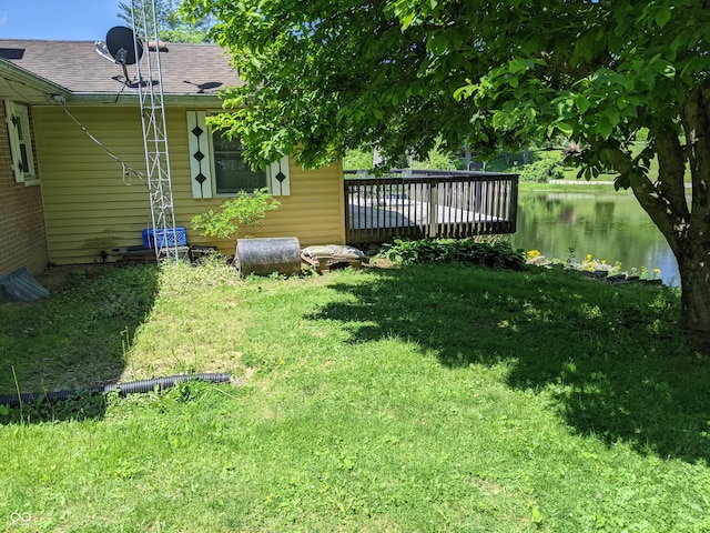 7114 Locust Lake W Dr, Spencer, IN 47460 - view of green lawn featuring a deck with water view