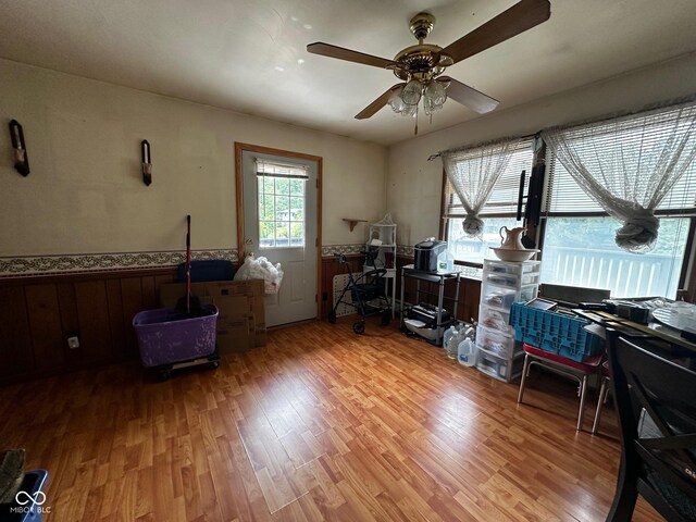 7114 Locust Lake W Dr, Spencer, IN 47460 - office space featuring wainscoting, light wood finished floors, and ceiling fan