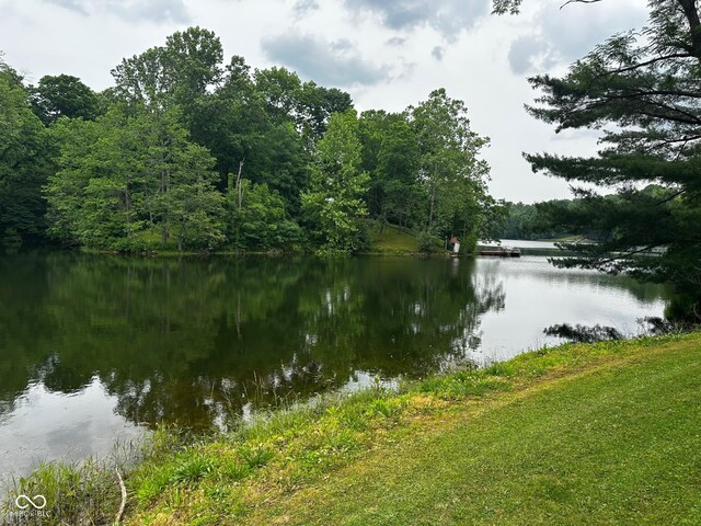 7114 Locust Lake W Dr, Spencer, IN 47460 - water view featuring a heavily wooded area