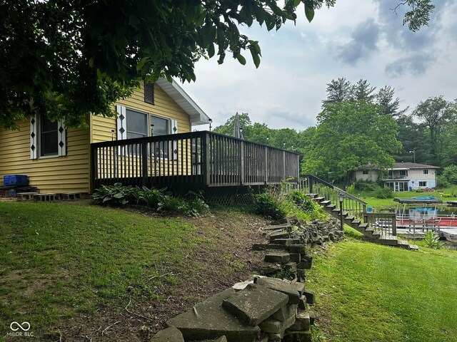 7114 Locust Lake W Dr, Spencer, IN 47460 - view of grassy yard with a deck and stairs