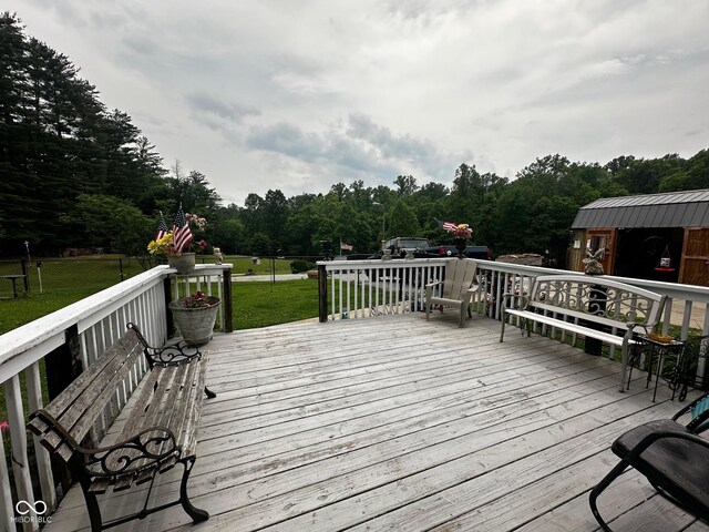 7114 Locust Lake W Dr, Spencer, IN 47460 - wooden deck featuring a yard and view of scattered trees