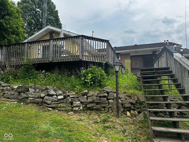 7114 Locust Lake W Dr, Spencer, IN 47460 - rear view of house featuring stairway and a wooden deck