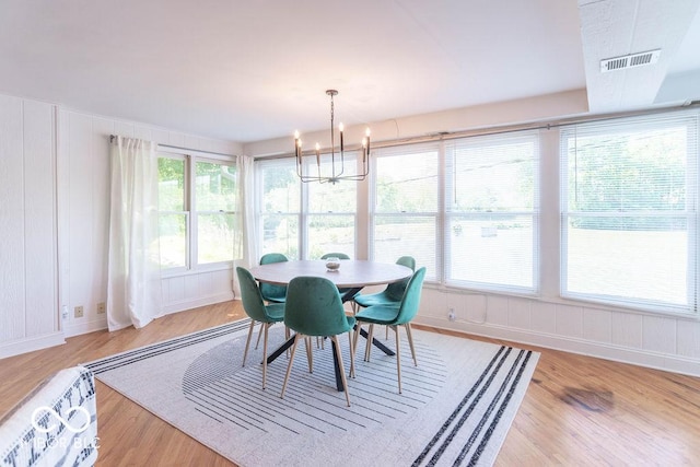 5078 Evergreen Ln, Gosport, IN 47433 - dining area with light wood finished floors, a chandelier, and baseboards