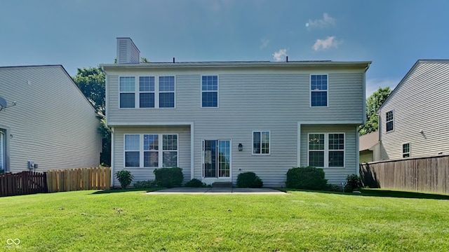 12878 Ari Ln, Fishers, IN 46037 - back of house with a chimney and a patio area