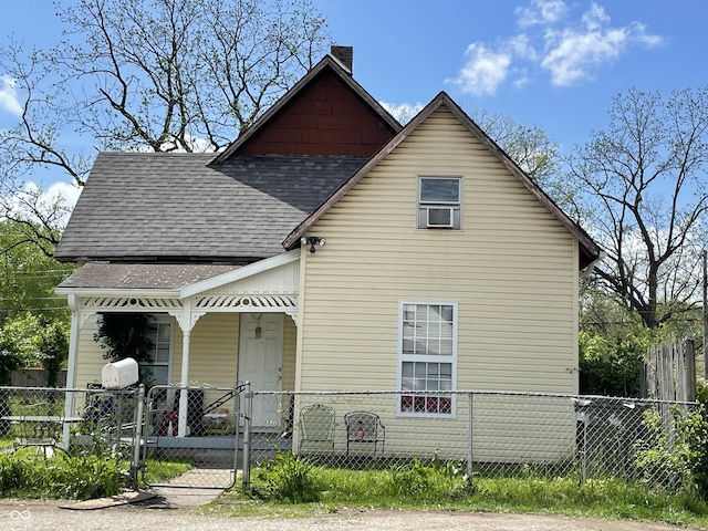 1164 Groff Ave, Indianapolis, IN 46222 - view of front of property with a porch, roof with shingles, a chimney, and a gate