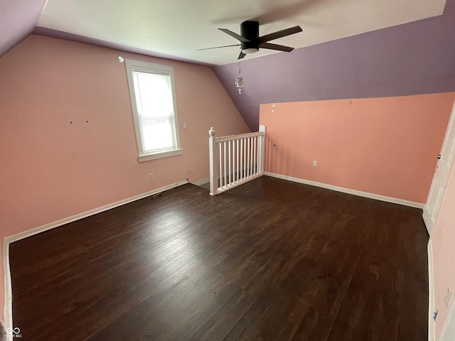 1164 Groff Ave, Indianapolis, IN 46222 - additional living space featuring vaulted ceiling, ceiling fan, dark wood finished floors, and baseboards
