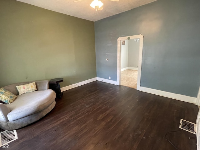 1164 Groff Ave, Indianapolis, IN 46222 - living area featuring wood finished floors, a ceiling fan, and baseboards