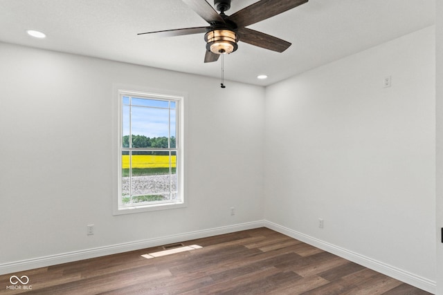 5003 W 900 N, Dupont, IN 47231 - unfurnished room featuring dark wood finished floors, baseboards, ceiling fan, and recessed lighting