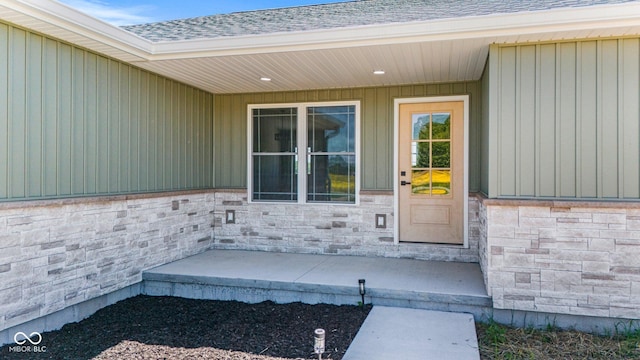 5003 W 900 N, Dupont, IN 47231 - property entrance with a shingled roof and stone siding