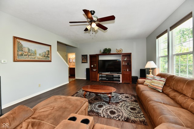 938 Weeping Way Ln, Avon, IN 46123 - living room featuring ceiling fan, dark wood-style flooring, and baseboards