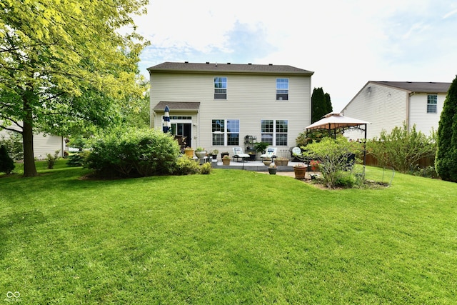 938 Weeping Way Ln, Avon, IN 46123 - back of house featuring a patio area, a gazebo, and a yard