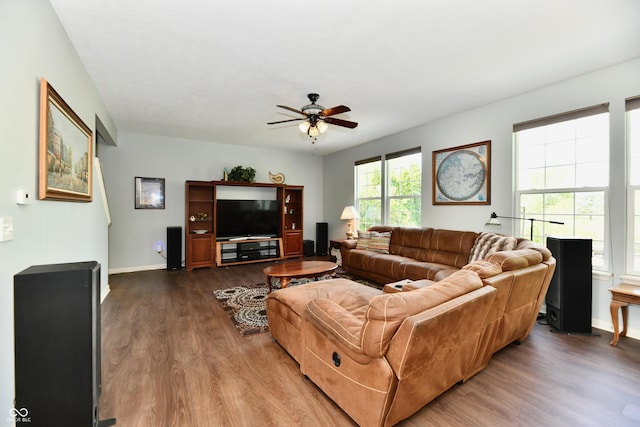 938 Weeping Way Ln, Avon, IN 46123 - living area with dark wood finished floors, a ceiling fan, and baseboards