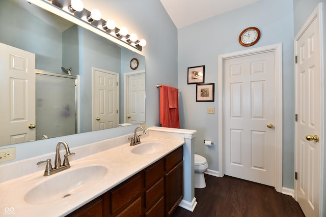 938 Weeping Way Ln, Avon, IN 46123 - bathroom featuring a shower stall, wood finished floors, baseboards, and toilet