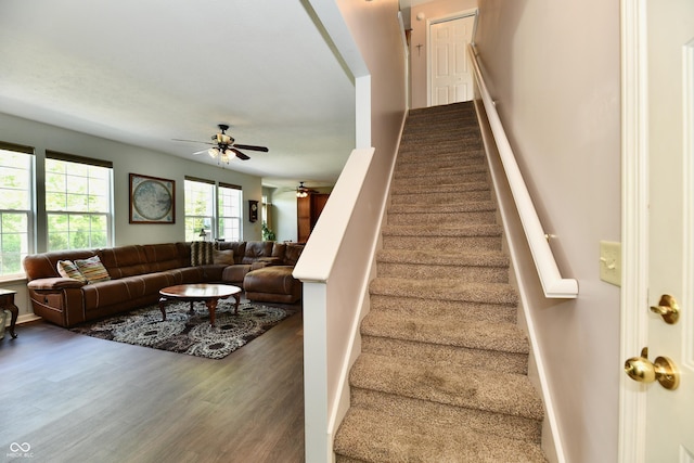 938 Weeping Way Ln, Avon, IN 46123 - stairway featuring ceiling fan and wood finished floors