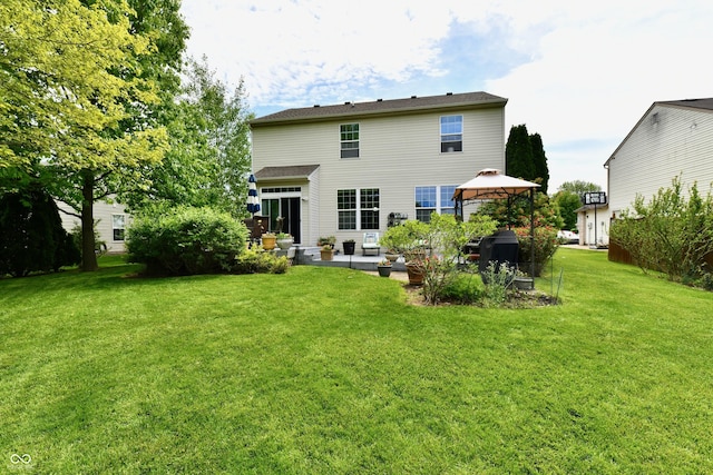938 Weeping Way Ln, Avon, IN 46123 - back of house with a gazebo, a patio, and a yard
