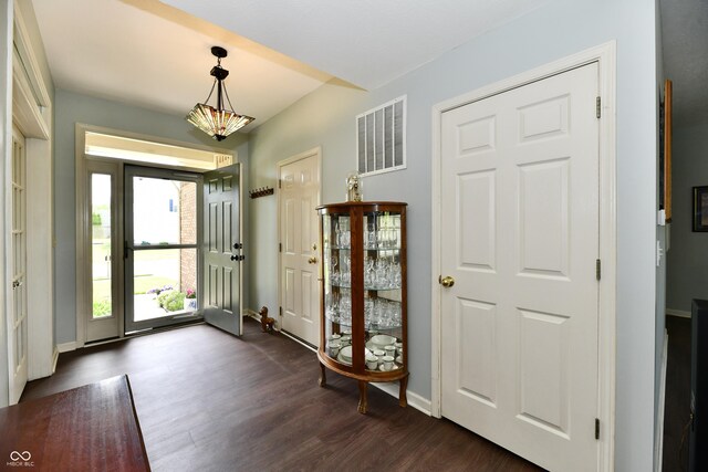 938 Weeping Way Ln, Avon, IN 46123 - entrance foyer featuring dark wood finished floors and baseboards