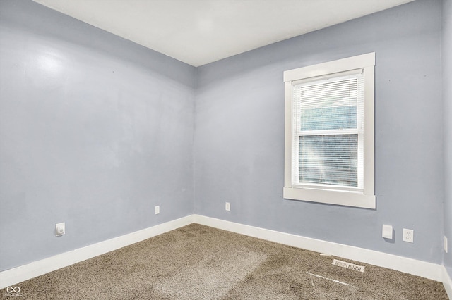 3109 E St Joseph St, Indianapolis, IN 46201 - carpeted spare room featuring baseboards