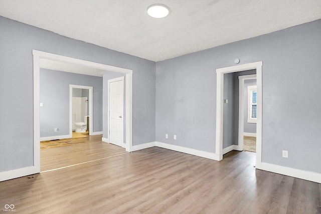 3109 E St Joseph St, Indianapolis, IN 46201 - spare room with wood finished floors and baseboards