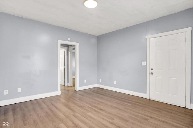 3109 E St Joseph St, Indianapolis, IN 46201 - unfurnished room with wood finished floors and baseboards