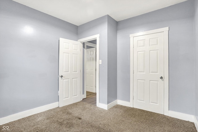 3109 E St Joseph St, Indianapolis, IN 46201 - unfurnished bedroom with carpet floors and baseboards