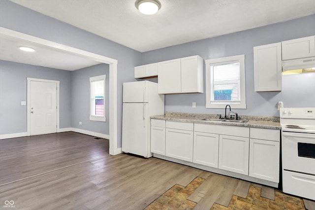 3109 E St Joseph St, Indianapolis, IN 46201 - kitchen featuring white appliances, a sink, under cabinet range hood, and white cabinetry