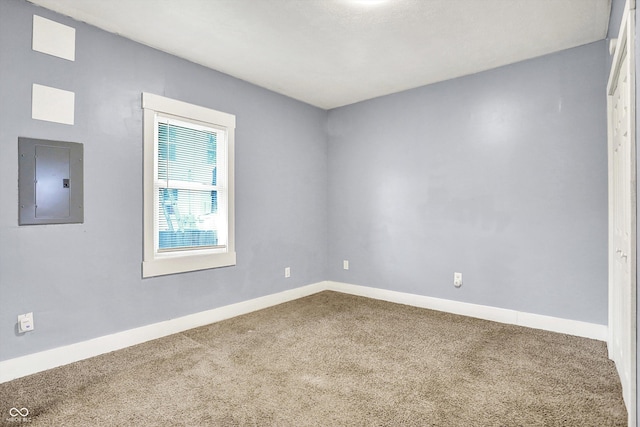 3109 E St Joseph St, Indianapolis, IN 46201 - carpeted empty room with electric panel and baseboards