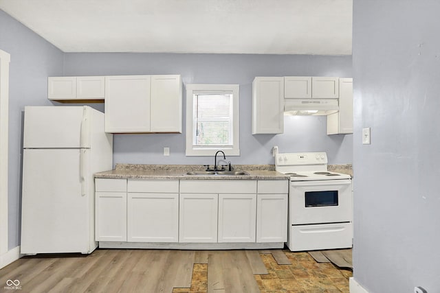 3109 E St Joseph St, Indianapolis, IN 46201 - kitchen featuring white appliances, a sink, under cabinet range hood, white cabinets, and light countertops