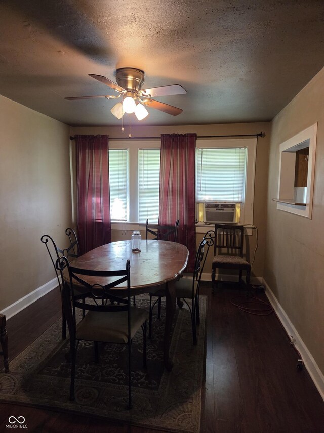 1168 N Gladstone Ave, Indianapolis, IN 46201 - dining area with dark wood finished floors, baseboards, ceiling fan, cooling unit, and a textured ceiling