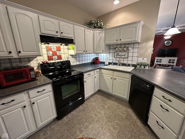 5486 Lipizzan Ln, Plainfield, IN 46168 - kitchen featuring black appliances, under cabinet range hood, a sink, dark countertops, and decorative backsplash