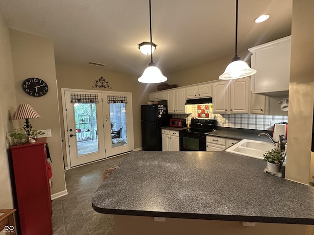 5486 Lipizzan Ln, Plainfield, IN 46168 - kitchen with black appliances, a sink, dark countertops, a peninsula, and white cabinets