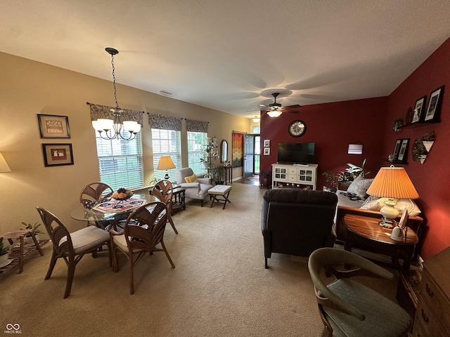 5486 Lipizzan Ln, Plainfield, IN 46168 - dining room with light colored carpet, a chandelier, and a ceiling fan