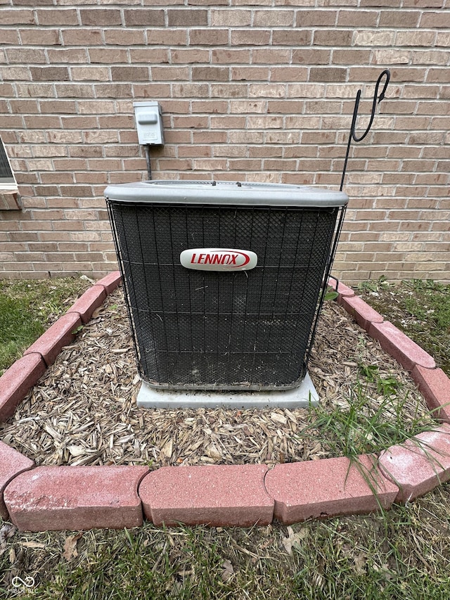 5486 Lipizzan Ln, Plainfield, IN 46168 - exterior view of cooling unit and brick siding