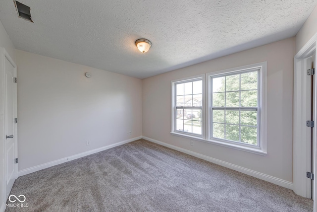 4055 Steelewater Way, Indianapolis, IN 46235 - carpeted empty room featuring baseboards and a textured ceiling