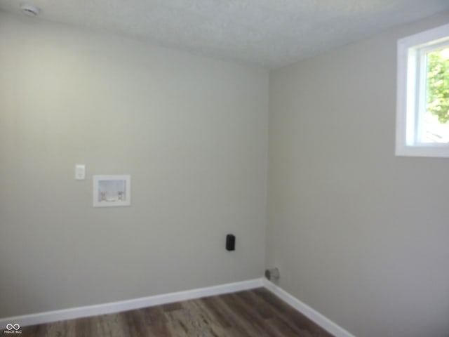 2007 Park Ave, Anderson, IN 46016 - laundry room featuring hookup for a washing machine, baseboards, and dark wood-style flooring
