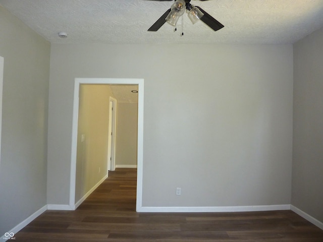 2007 Park Ave, Anderson, IN 46016 - unfurnished room featuring wood finished floors, a ceiling fan, baseboards, a textured ceiling, and a smoke detector