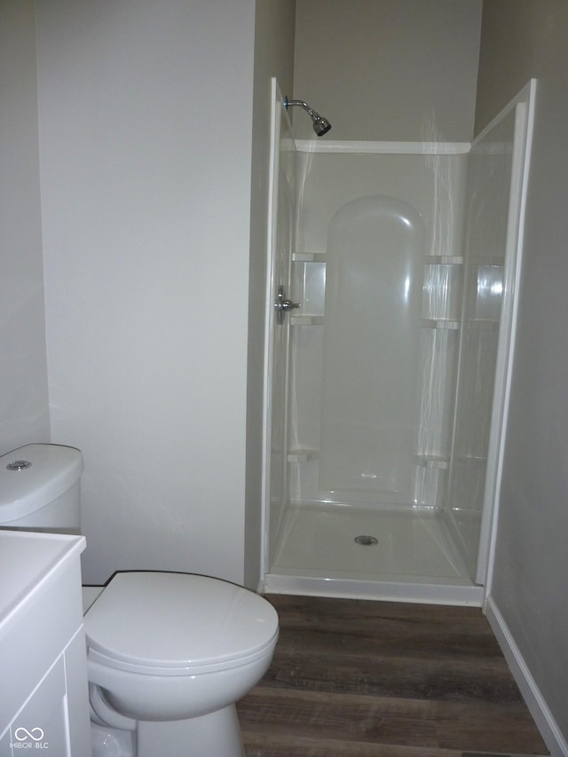 2007 Park Ave, Anderson, IN 46016 - full bath with toilet, wood finished floors, and walk in shower