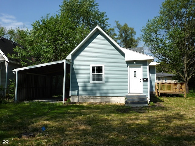 2007 Park Ave, Anderson, IN 46016 - back of property featuring a yard and a deck