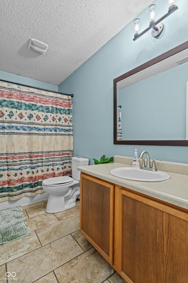 805 Sunvista Dr, Avon, IN 46123 - full bathroom with toilet, a textured ceiling, vanity, and shower / tub combo with curtain