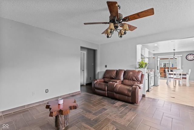 805 Sunvista Dr, Avon, IN 46123 - living area featuring ceiling fan and a textured ceiling
